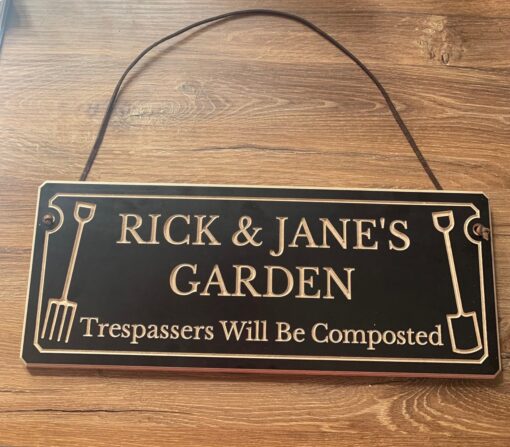 garden sign with hanging strap