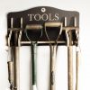 Wooden Garden Tool storage rack engraved with Tools