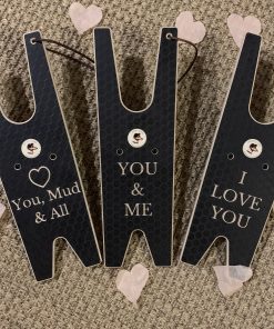 wooden boot pullers with words of love