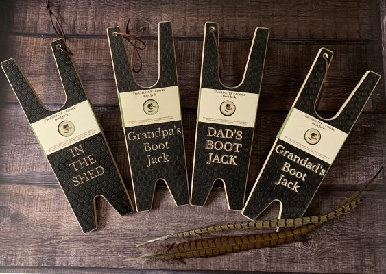 Father's Day Gift Ideas - 4 boot jacks on a wooden floor