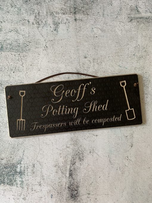 Garden/Shed sign with leather handing strap.