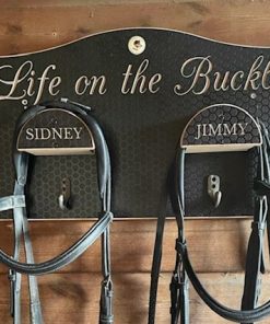 Personalised bridle hooks - engraved with life on the buckle and jimmy and sidney on each hanger.