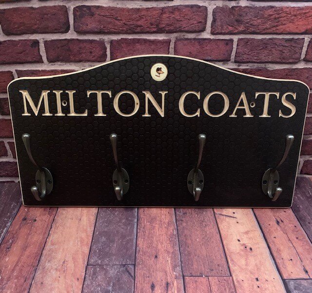 Wooden coat rack with 4 hooks personalised with Milton Coats