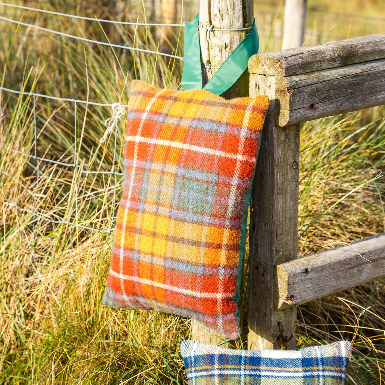 garden kneeler hanging on a fence post - very thick and comfortable with waterproof backing