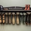 welly boat rack hung on a wall