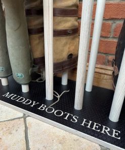 Close up of floor standing welly rack stand.