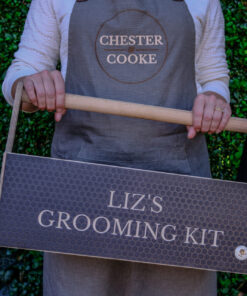 holding the grooming kit box