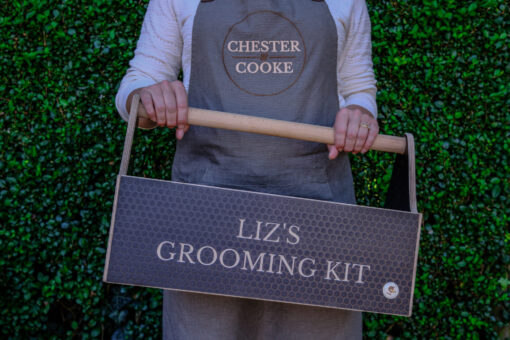 holding the grooming kit box