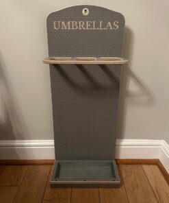 A practical present for valentine's day a wooden engraved umbrella stand.