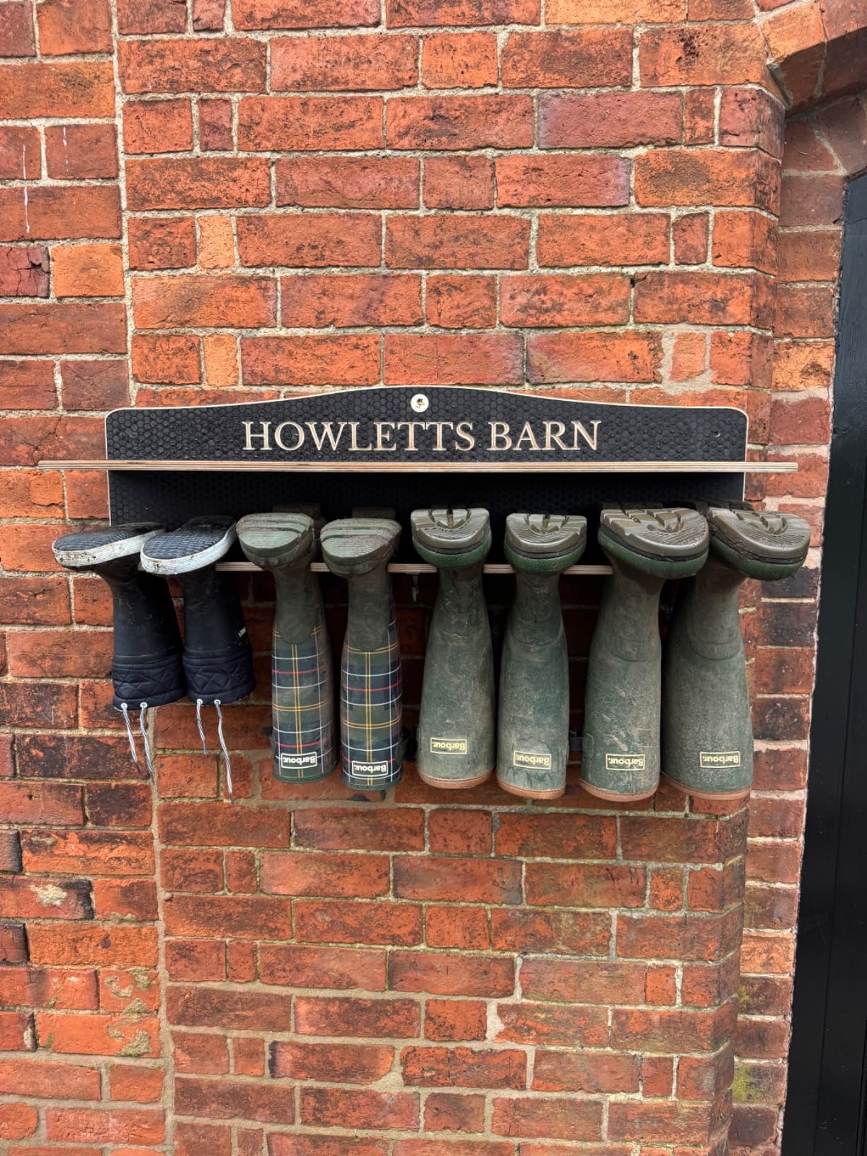 4 pair welly boot racks with a personalisation and a shelf.