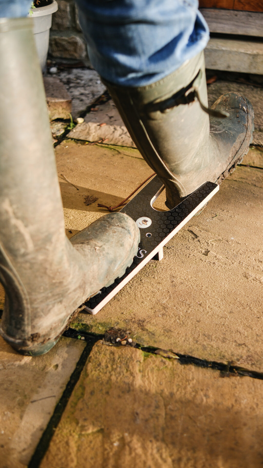 using a wooden boot puller