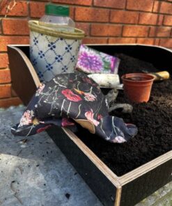 side view of this potting tray shows the amount of compost it can hold.
