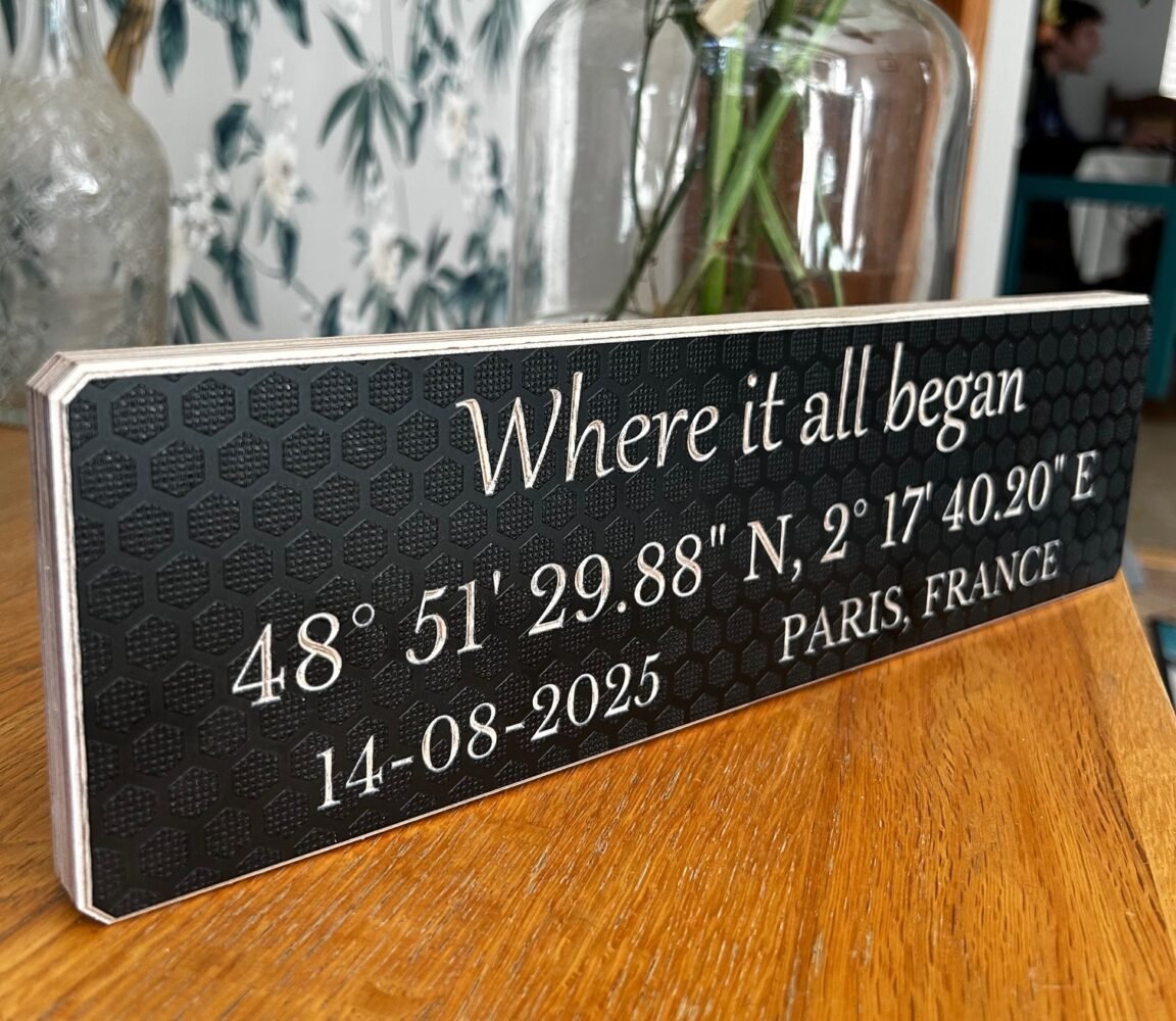 a unique wedding gift is a wooden coordinates sign